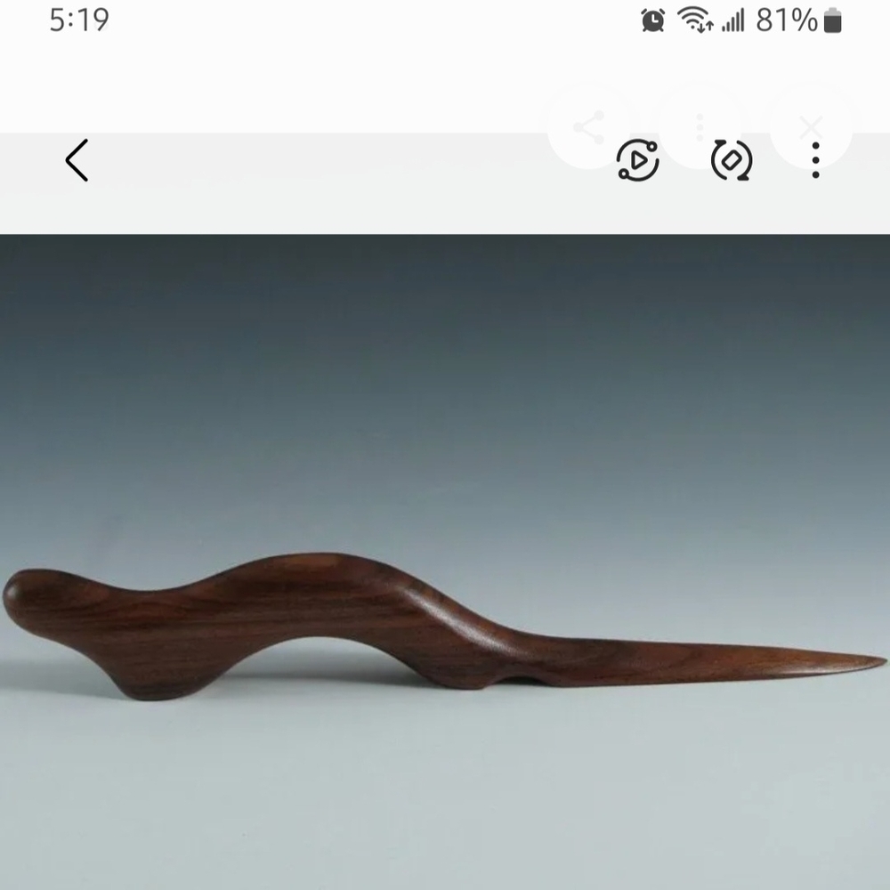 Artistic Wooden Sculpture in Rich Brown